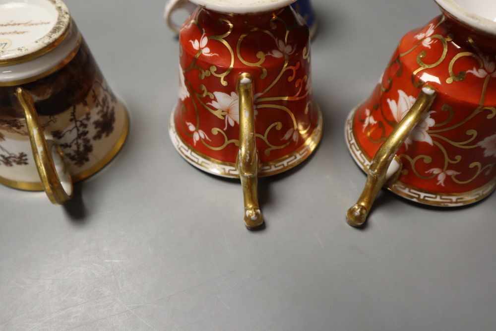 A pair of Chamberlain rare shaped cups and saucer, the handle with animal heads and two Chamberlain coffee cups, one with landscape and